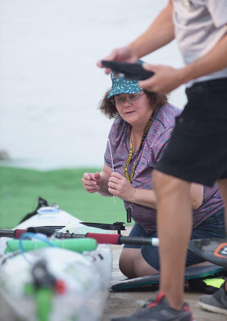 Shelia Hansel works on boat
